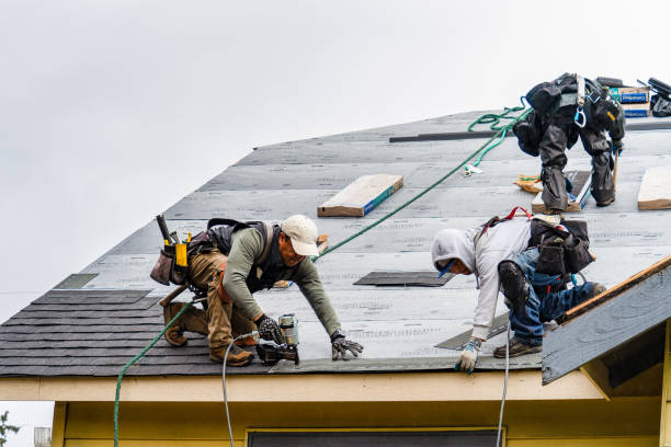 Professional Gutter Installation technician working in Marchand, PA